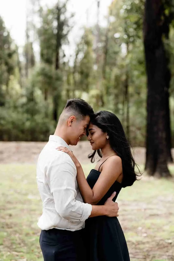 Couple Sharing a Special Proposal Moment During Photoshoot