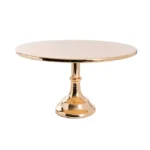 Round gold pedestal display table
