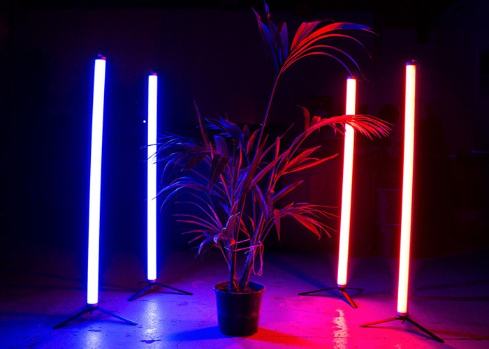 Vertical LED light tubes glowing in blue and red tones