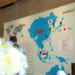Interactive world map display wall setup for corporate exhibition events