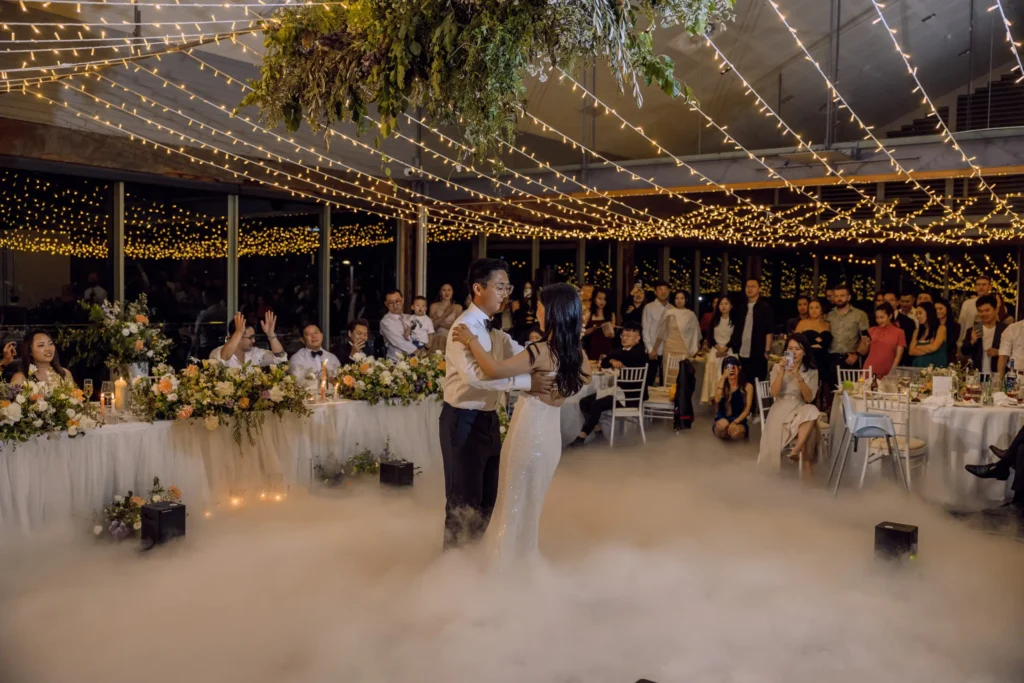 Wedding reception with festoon lighting canopy
