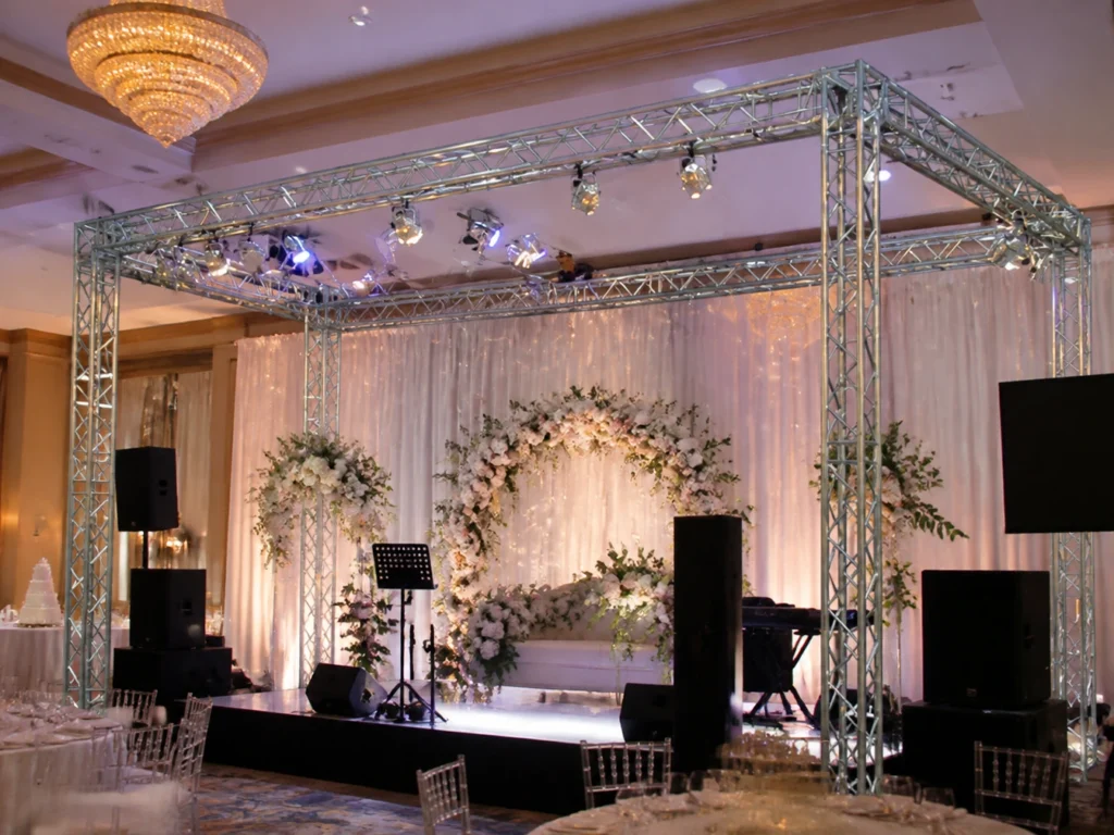 Stage decoration setup supported by metal truss system structure.