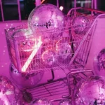 Neon-lit mirror ball trolley display