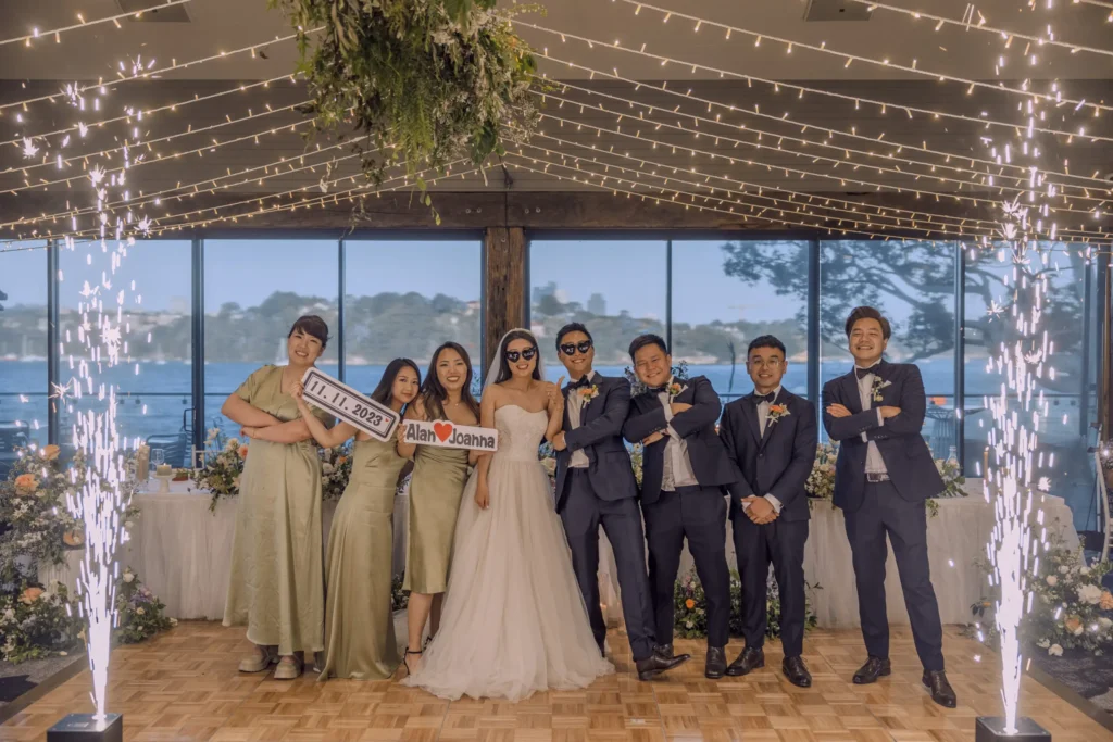 Group photo under festoon lights