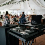 Professional DJ sound system setup inside a wedding reception venue.