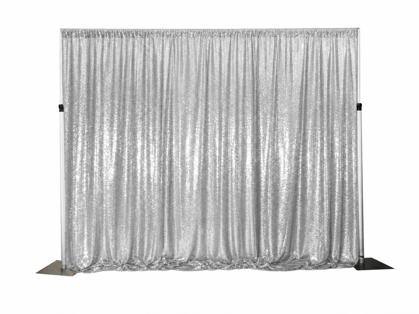 Silver metallic tinsel fringe curtain backdrop display.