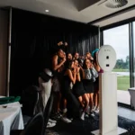 Guests Smiling and Creating Custom AI Images at Photo Booth